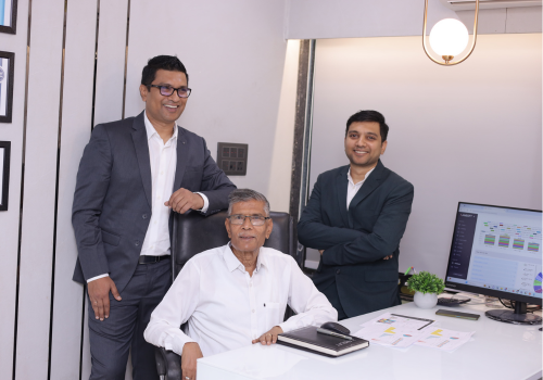 M.L. Talesara with co-founders Parikshit Talesara and Prashant Talesara at Kansoft office