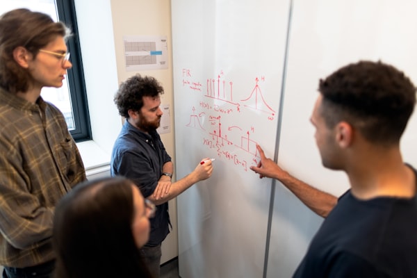 Engineer reviewing code carefully